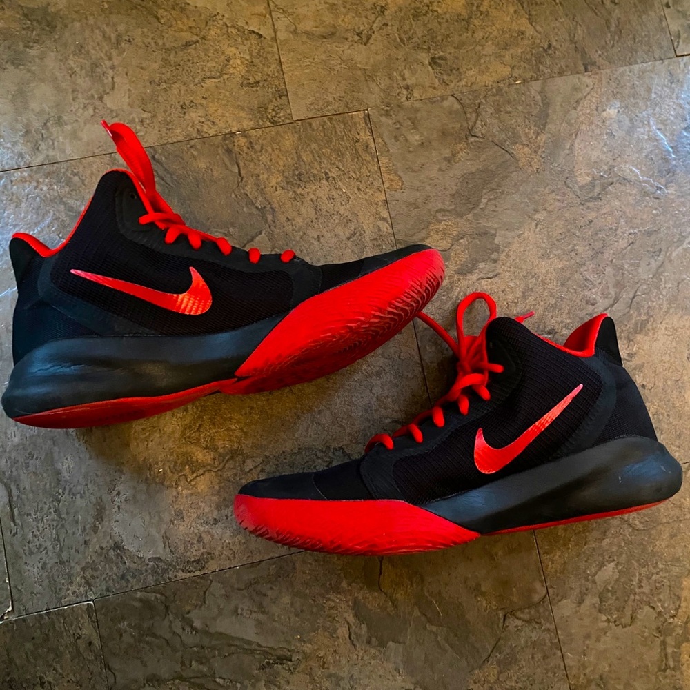 Red and black Nike basketball shoes
